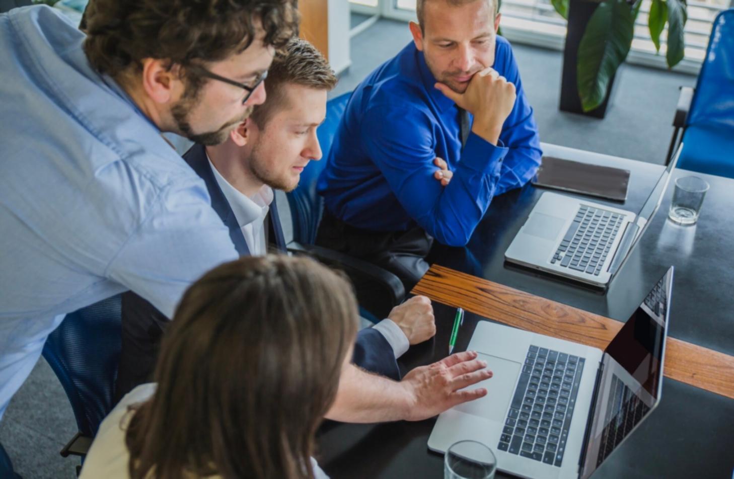 Students learning budget planning techniques in classroom setting